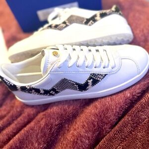 NWT Stuart Weitzman Daryl Sneaker in White with Snake Skin design.